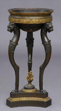 Appraisal: EMPIRE-STYLE BRONZE AND GILT-BRONZE TORCHERE The shaped dish with removable