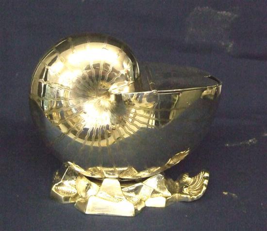 Appraisal: Victorian EPNS engraved nautilius shell spoon warmer on rocky base