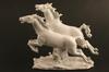 Appraisal: FIGURINE - German white porcelain figurine of two galloping horses