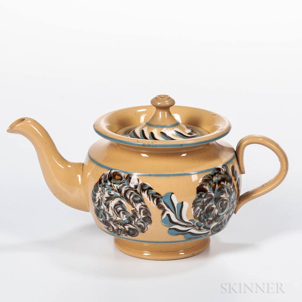 Appraisal: Slip-decorated Yellowware Teapot Slip-decorated Yellowware Teapot England c the body