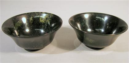 Appraisal: Pair of green hardstone bowls late th century Of flared