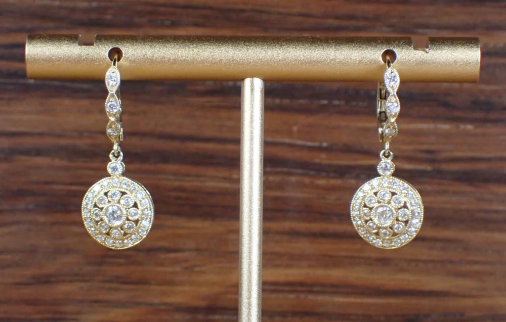 Appraisal: PAIR OF DIAMOND AND FOURTEEN KARAT GOLD EARRINGS each k