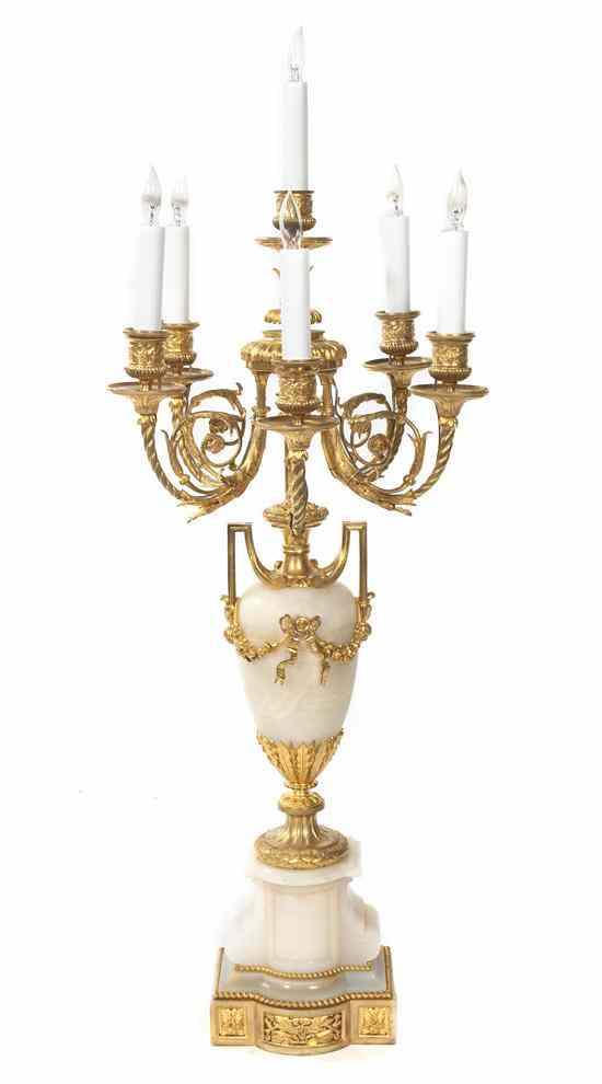 Appraisal: A Louis XVI Style Gilt Bronze and Onyx Six-Light Candelabra