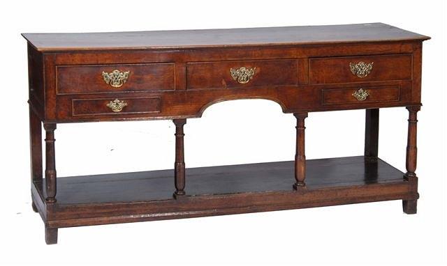 Appraisal: AN TH CENTURY OAK DRESSER BASE fitted three long and