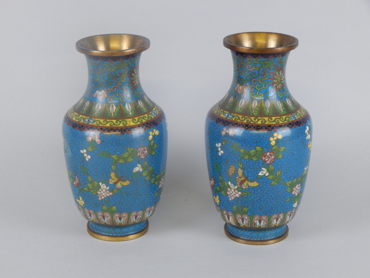 Appraisal: A pair of thC oriental cloisonne vases each decorated with