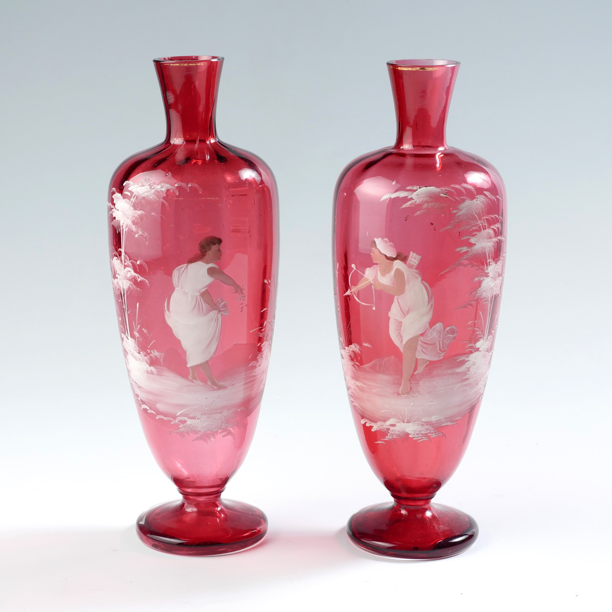 Appraisal: PAIR OF CRANBERRY MARY GREGORY VASES Optic paneled Mary Gregory