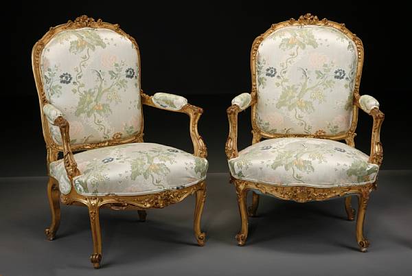 Appraisal: A pair of Louis XV style giltwood fauteuils la reine