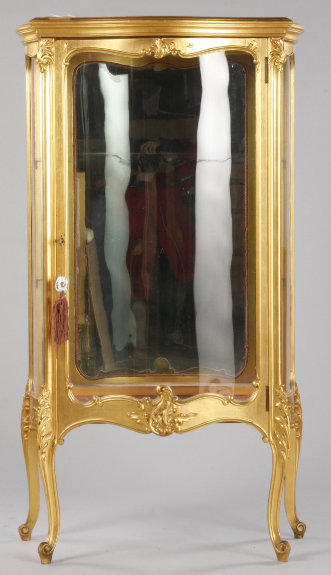 Appraisal: Louis XV giltwood carved case glass bow front door and