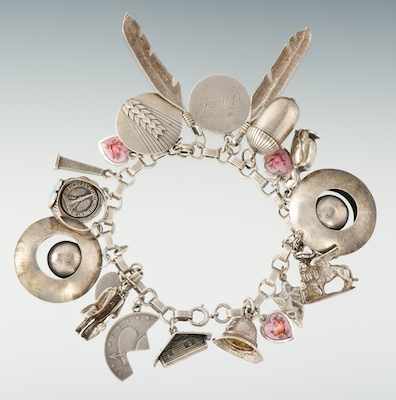 Appraisal: A Sterling Silver Bracelet with Three Georg Jensen and Other