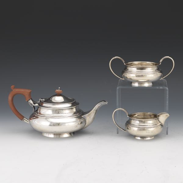 Appraisal: WALKER HALL STERLING SILVER TEA SET CA Sterling silver teapot