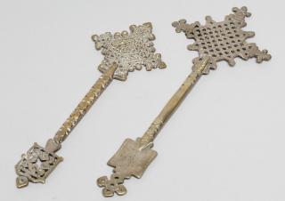 Appraisal: Ethiopian Nickel Coptic Processional Crosses With interlocking knotting the shafts