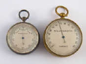 Appraisal: An aneroid barometer and a gilt metal thermometer both with