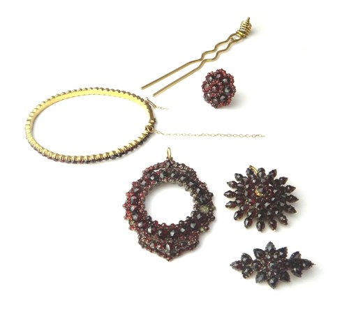 Appraisal: A group of Bohemian garnet set jewellery comprising an oval