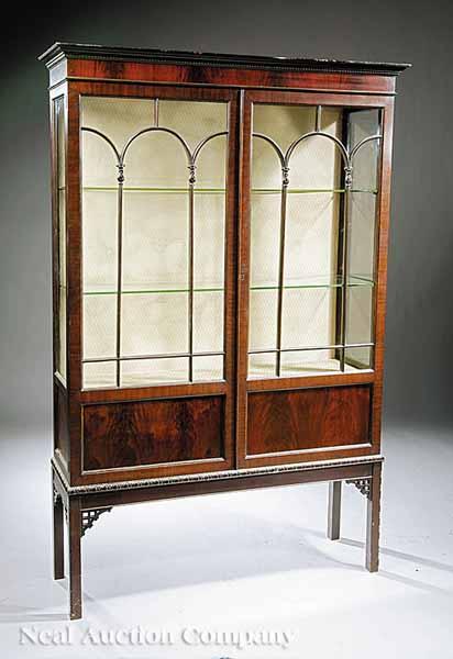 Appraisal: An Edwardian Mahogany China Cabinet in the Chippendale Taste early