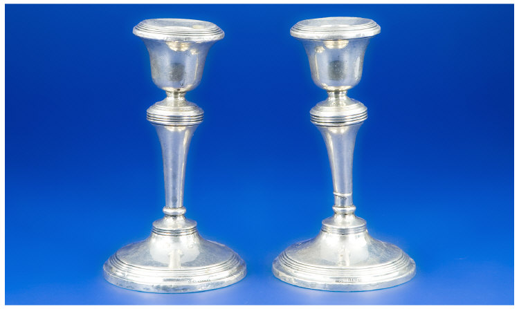 Appraisal: Pair Of Silver Candlesticks Of Circular Tapering Form Raised On