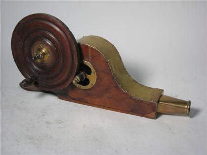 Appraisal: Brass and mahogany patent model blower th century Small blower