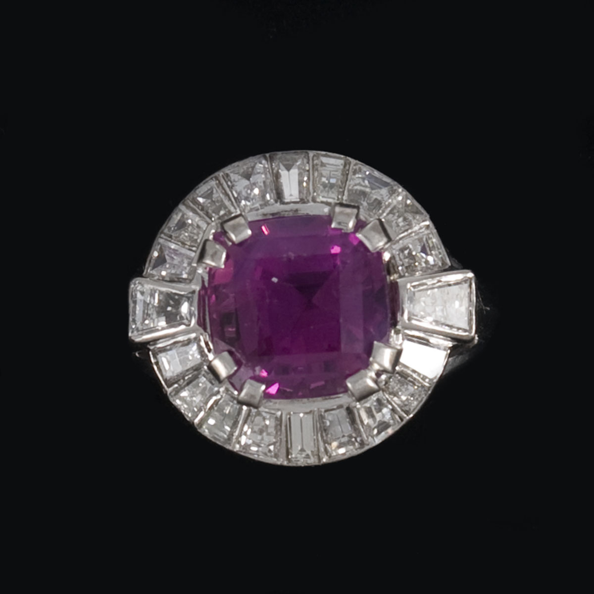 Appraisal: PINK SAPPHIRE DIAMOND AND PLATINUM RING The ring is set