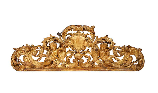 Appraisal: A LATE TH CENTURY CARVED GILTWOOD AND GESSO CRESTING centred