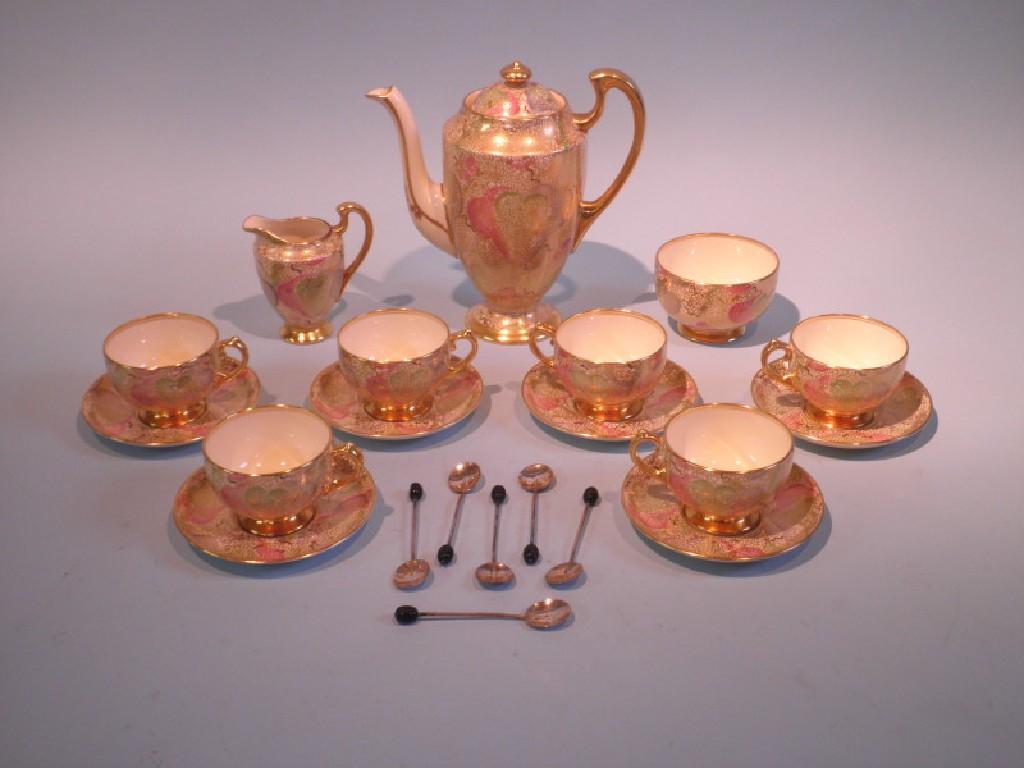 Appraisal: An early thC porcelain coffee service decorated in blue pink