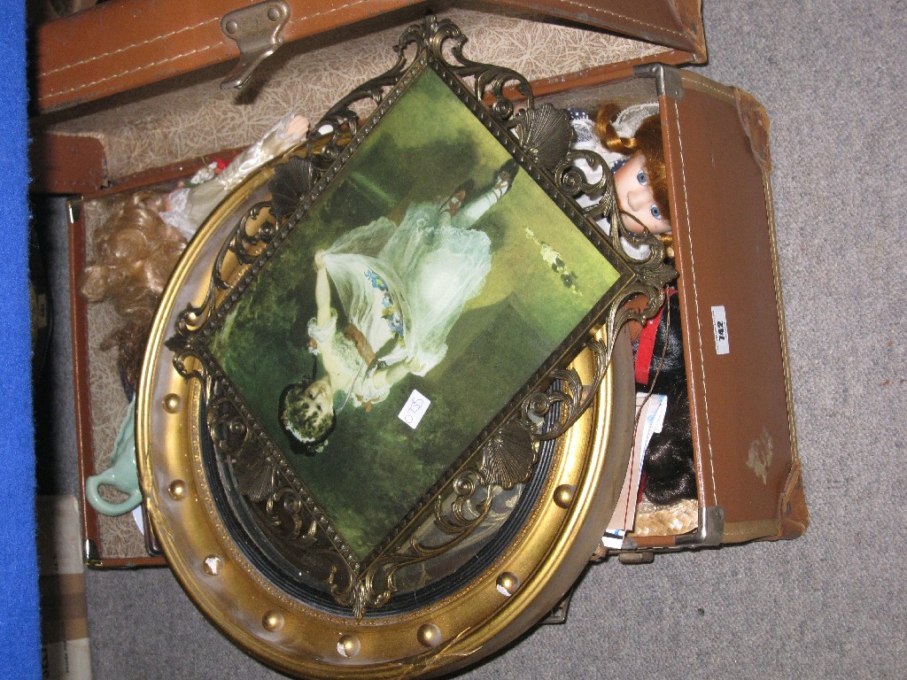 Appraisal: Lot comprising a suitcase of assorted dolls and a mirror