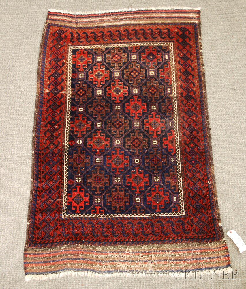 Appraisal: Baluch Rug Northeast Persia early th century crease repair top