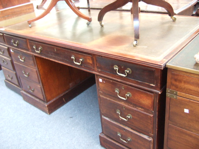 Appraisal: A th century mahogany pedestal desk the gilt tooled green