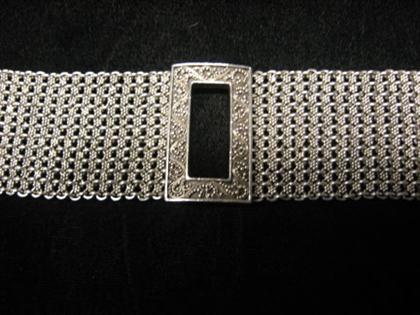 Appraisal: Woven sterling silver bracelet Heavy sterling silver bracelet with floral