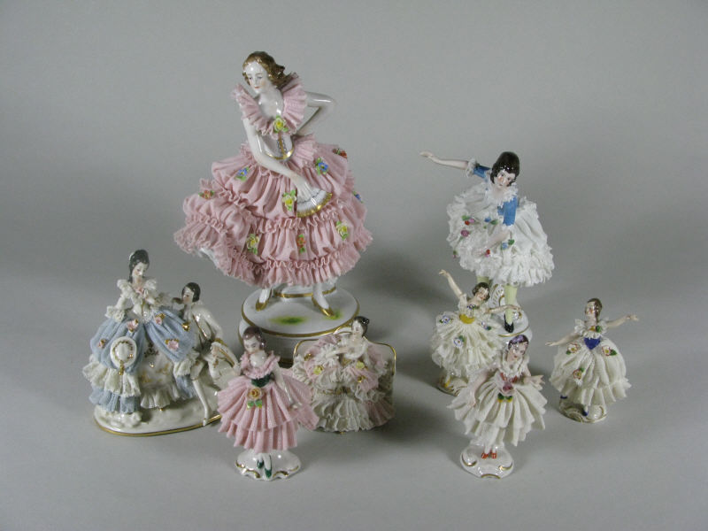 Appraisal: Group of Eight Dresden Lace Figurines ballerinas with lace net