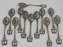 Appraisal: Twelve gilt metal teaspoons with enamelled bowls and finials of