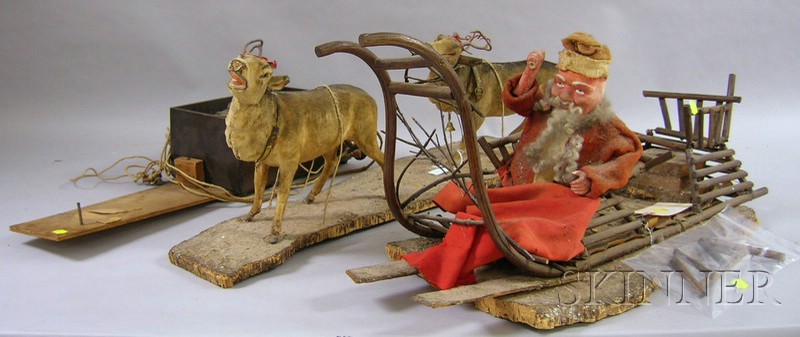 Appraisal: German Papier-mache Automaton of Santa in a Sleigh Drawn by