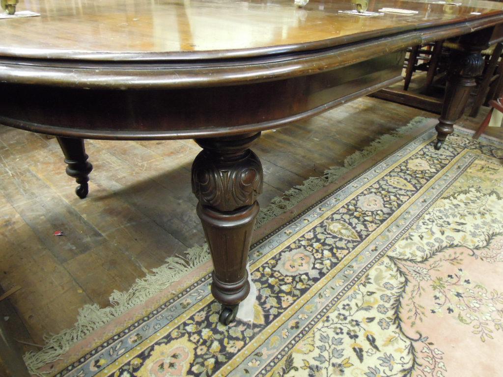 Appraisal: A Victorian mahogany 'D' end extending dining table fitted with