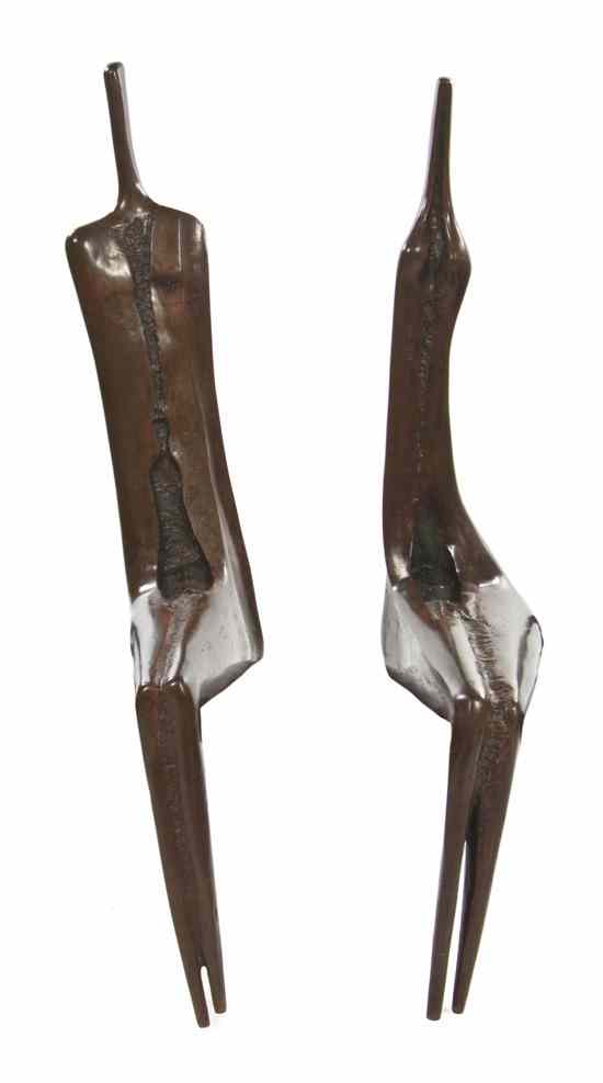 Appraisal: Aharon Bezalel Afghani Israeli b A pair of figures bronze