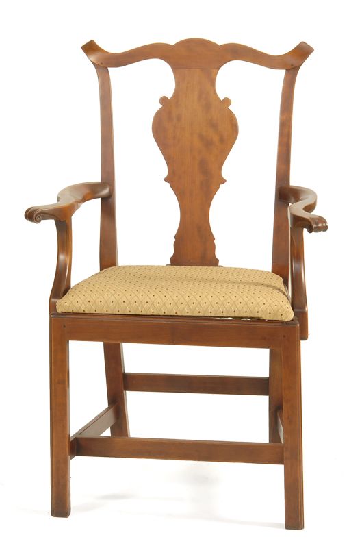 Appraisal: ELDRED WHEELER CHIPPENDALE-STYLE ARMCHAIR In cherry with scrolled splat back