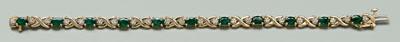 Appraisal: Emerald diamond bracelet eleven oval faceted emeralds estimated total weight