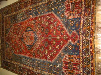 Appraisal: A KASHGAI RUG the blue field with large red floral