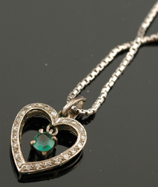 Appraisal: GREEN STONE SET PENDANT TO A CT WHITE GOLD BOX