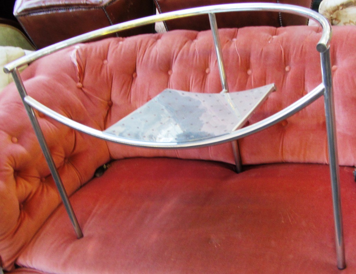 Appraisal: A th century polished chrome tubular armchair by Philippe Starck