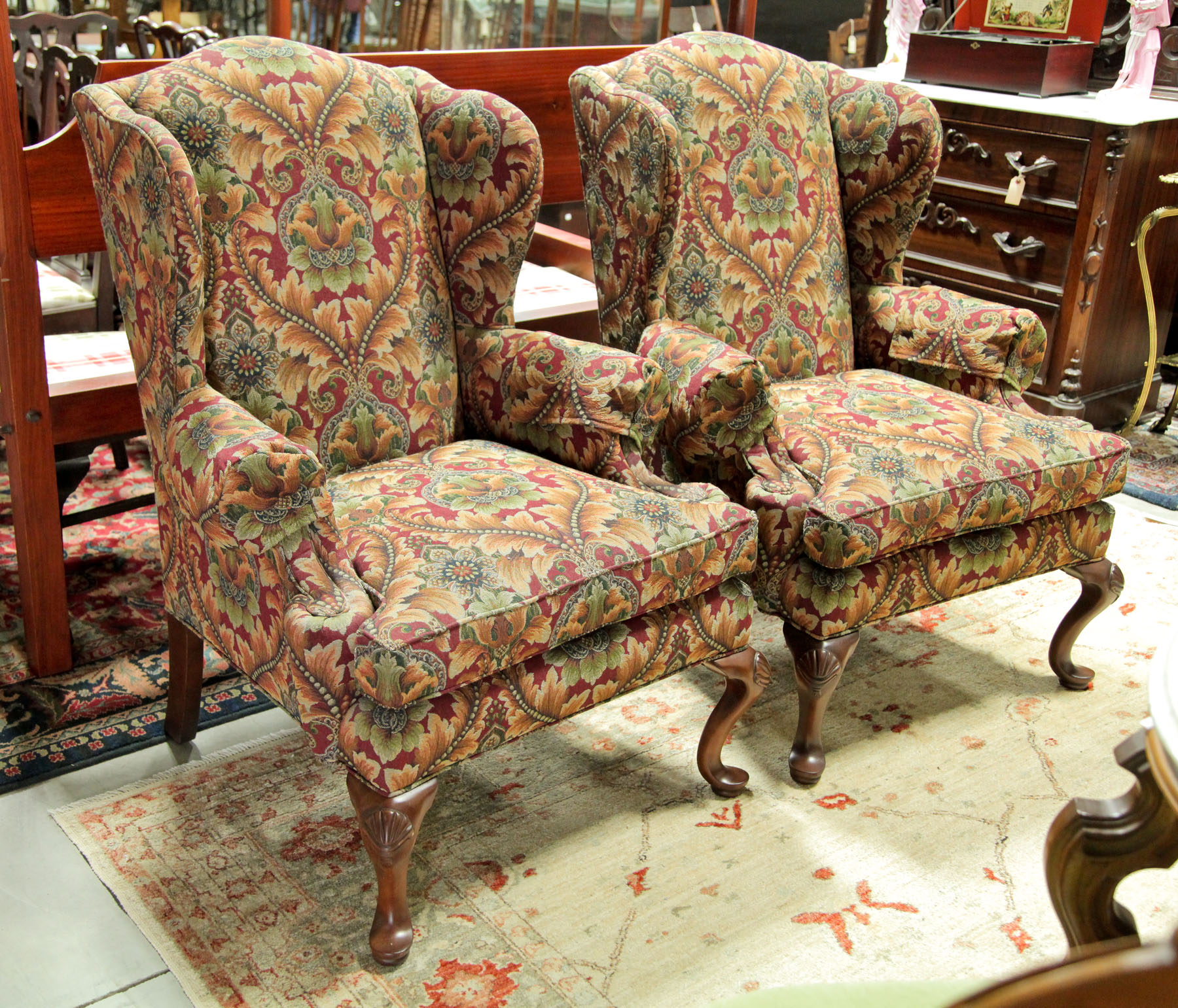 Appraisal: PAIR OF HENREDON WING CHAIRS American st century Mahogany frames