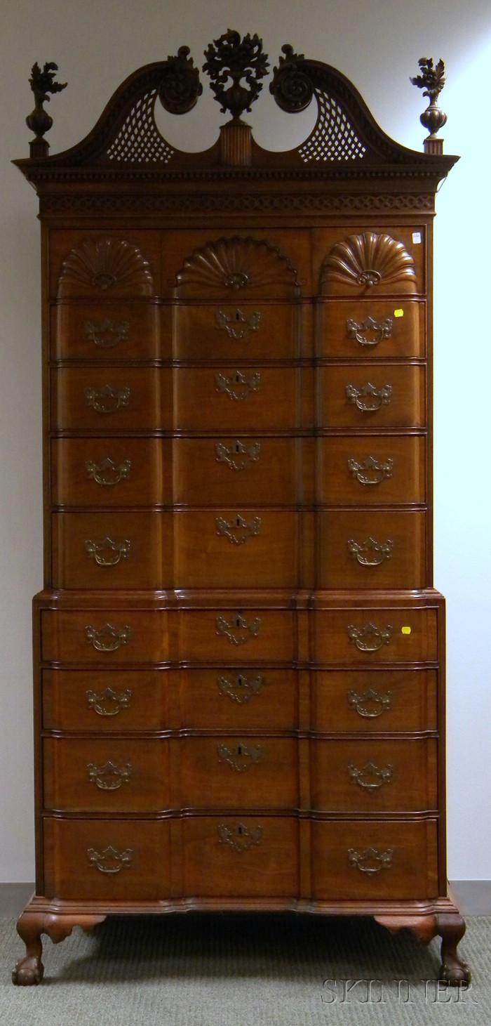 Appraisal: Chippendale-style Carved Mahogany Scroll-top Blockfront Chest-on-Chest in two parts drawers