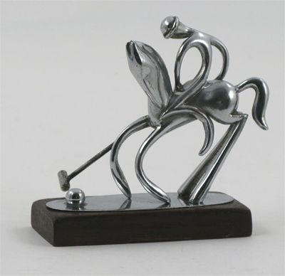 Appraisal: A Hagenauer silvered bronze figure of a polo player on