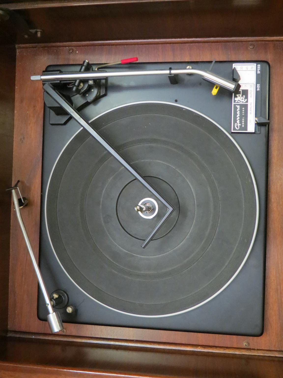 Appraisal: A Dynatron radiogramme with Garrard record deck burr walnut cabinet