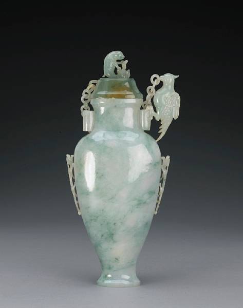 Appraisal: A large mottled jadeite covered vase Of flattened pear shape