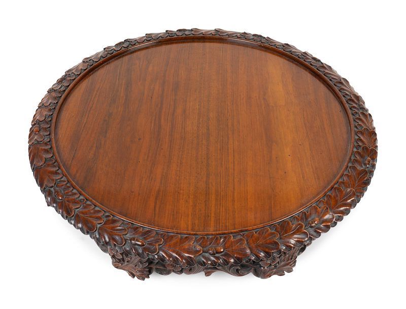 Appraisal: A Georgian Carved Mahogany Lazy Susan Height x diameter inches