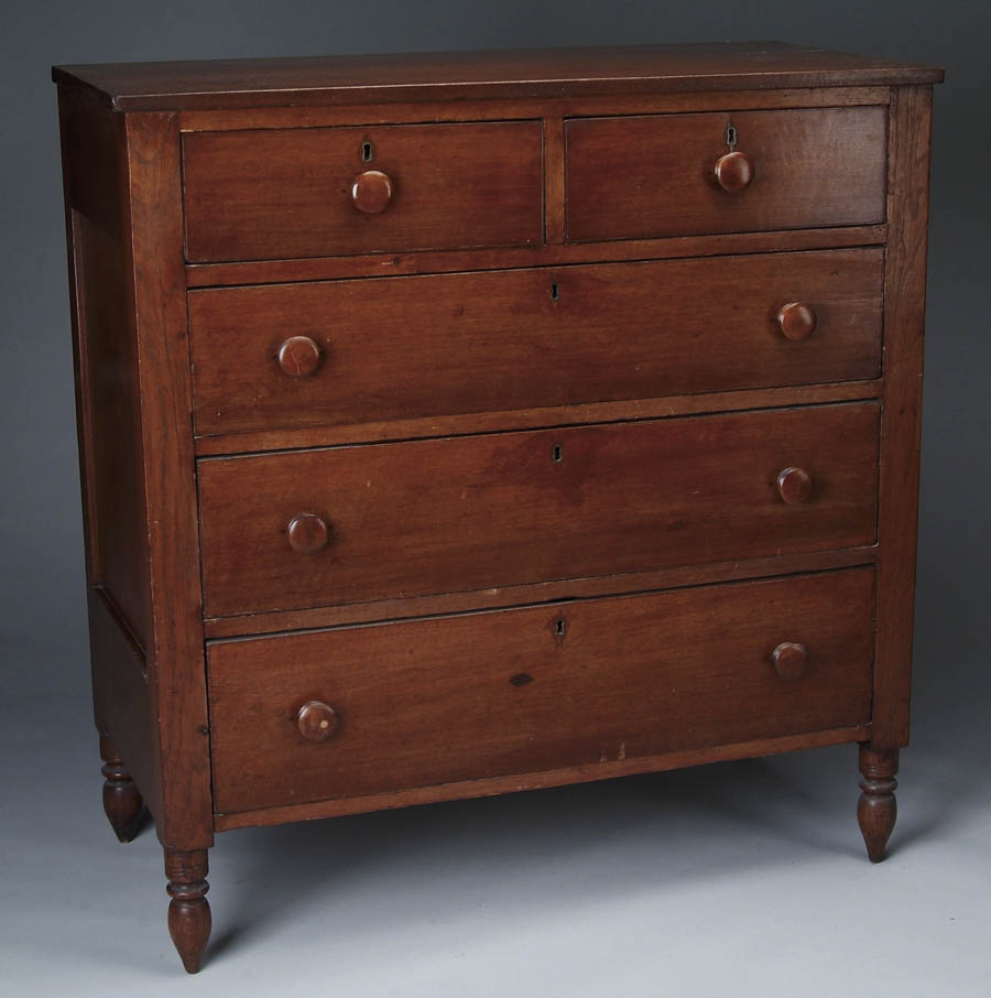 Appraisal: TWO OVER THREE DRAWER WALNUT SHERATON CHEST Paneled sides Two