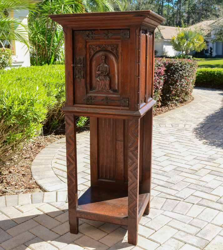 Appraisal: BELGIAN CARVED OAK RECTORY SIDE CABINET Figural carved panel door