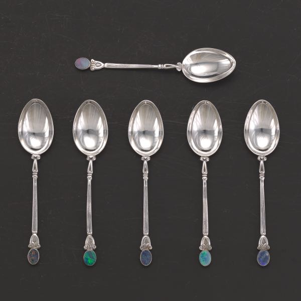 Appraisal: A SET OF STERLING SILVER AND AUSTRALIAN OPAL DEMITASSE SPOONS