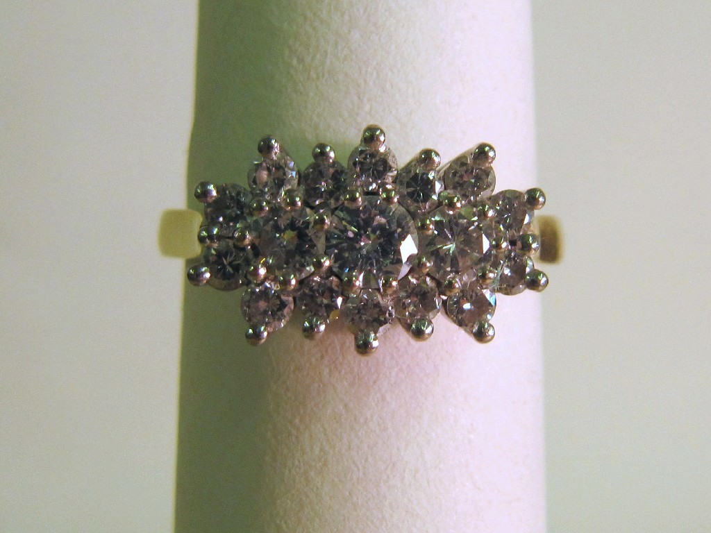 Appraisal: Eighteen carat gold diamond cluster ring brilliant cut diamonds in