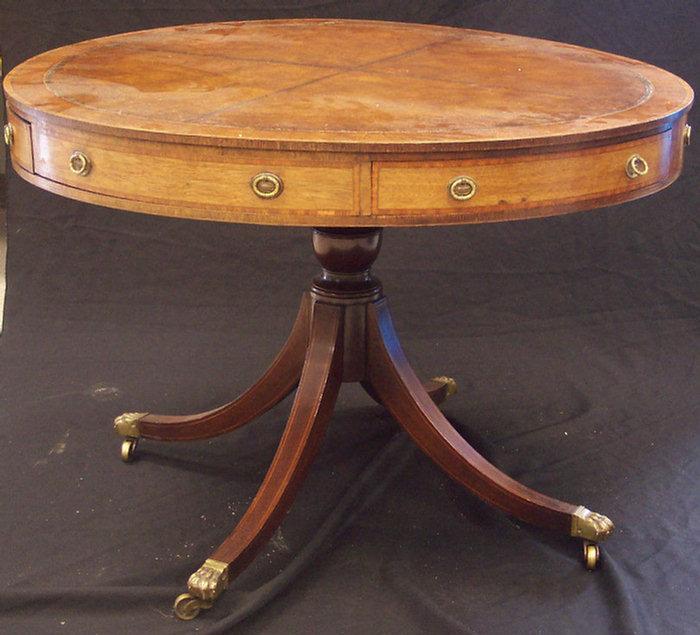 Appraisal: Mahogany Regency leather top drum table with drawers diameter high