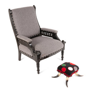 Appraisal: A Victorian Black Painted Armchair and Cow-Horn Footrest th and