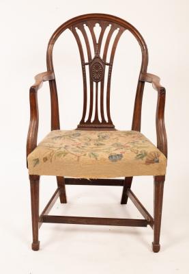 Appraisal: A late th Century mahogany armchair the pierced upright splat